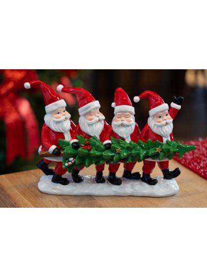 CENTRE DE TABLE RESINE 4 PERES NOEL TENANT UN SAPIN 29CM X 9CM X 19.5CM