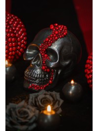 BLACK POLYRESIN SKULL WITH BLOODY RED BEADS 15CM X 23CM X 18CM